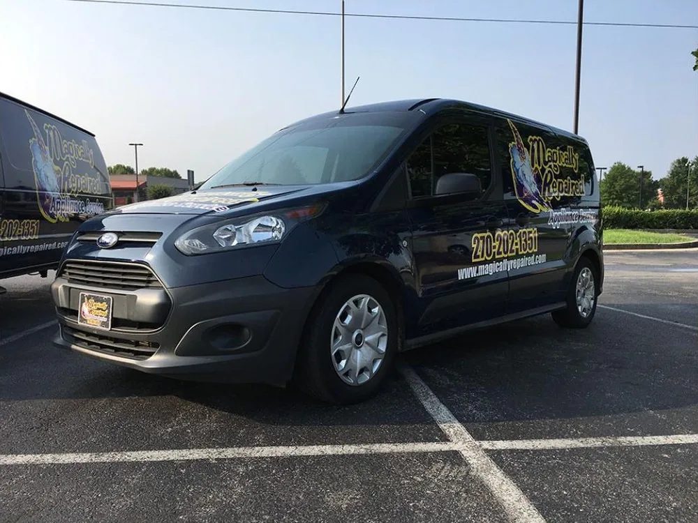A Magically Repaired service van, front view